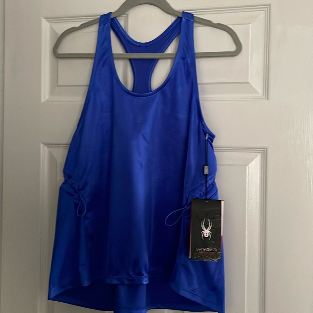 Women’s Spyder workout top royal blue pulls under rib cage size medium